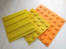 Rubber tactile tiles